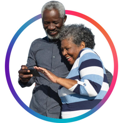Senior couple holding phone